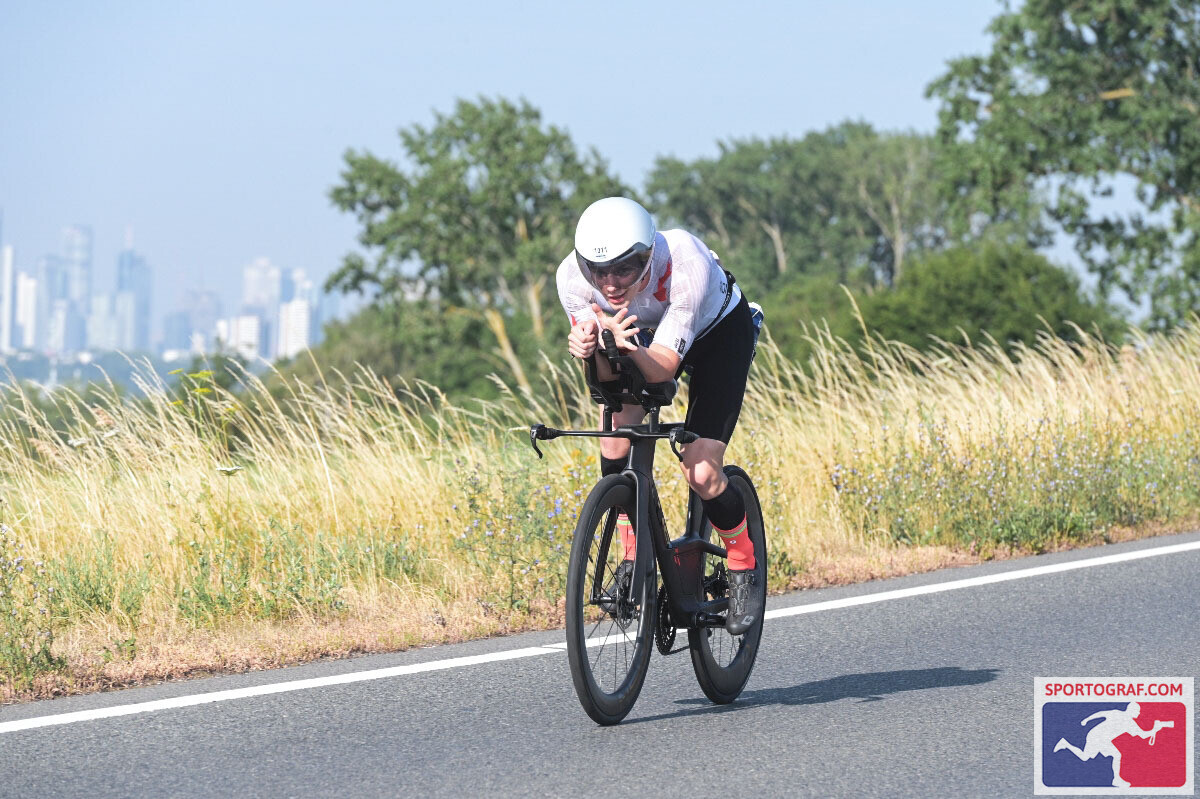 Danny Verdel on the time trial bike with the Frankfurt skyline behind, Ironman Frankfurt 2026